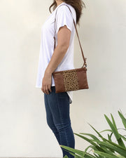SPOTTED CALF HAIR CLUTCH- Cognac